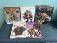 Group shot of all five flower arrangement books