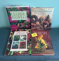 Front covers of all four floristry books
