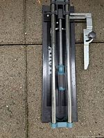 Top view of Anvil manual tile cutter showing dual rails and base