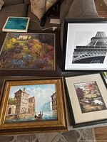 All five framed artworks displayed together