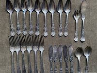 Flat lay of all 25 Orange Blossom pieces