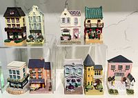Group shot of all nine miniature porcelain buildings