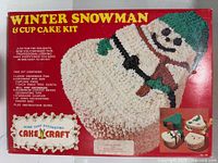 Front of boxed Winter Snowman & Cup Cake Kit with contents list