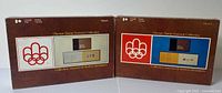 Front view of both Olympic Stamp Souvenir Collection albums showing Volume 1 and Volume 2 covers