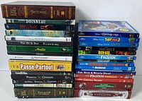 Both stacks of DVD/Blu-ray cases showing visible titles