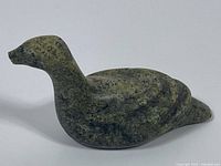 Left profile of soapstone loon carving