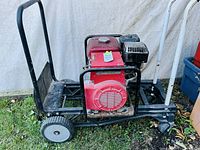 Full view of Honda generator on cart