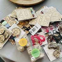 All craft kits and contents spread on table