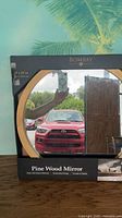 Front view of boxed Bombay pine wood mirror