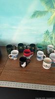 Group shot of all mugs on table