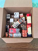 Box containing assorted vacuum tube boxes of various brands