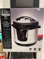 Front view of boxed Elite Platinum EPC-808 pressure cooker