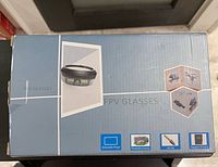 Front of retail box showing FPV glasses image and basic icons