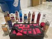 All bottles and gift basket arranged together on floor