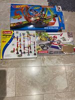 All three boxed sets laid out on floor