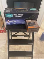 Boxes of Eyeskey spotting scope and Eyoyo rangefinder