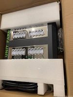 Lamp in box with foam inserts