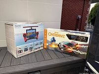 Both boxed items side by side showing packaging fronts