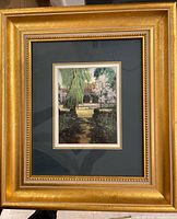 Front view of framed garden landscape print