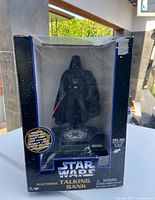 Front view of boxed Darth Vader electronic talking bank