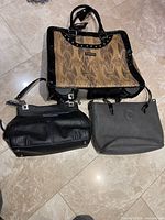All three handbags arranged together