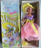 Front view of boxed Spring Blossom Barbie showing doll, accessories, and floral artwork packaging