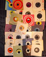 All 31 records laid out to show label variety and sleeves