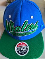 Front view of Hartford Whalers Zephyr snapback cap showing embroidery and sticker
