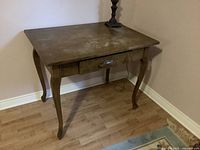 overall view of wood side table showing drawer and legs