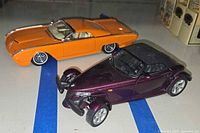 Both model cars side by side showing overall condition and colors