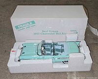 Diecast car secured in Styrofoam inside original box