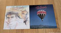 Front jackets of both Air Supply albums
