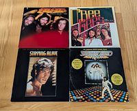 Front jackets of all four Bee Gees vinyl albums