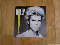 Front sleeve with Billy Idol portrait and title