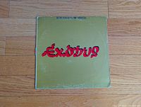 Front cover of Exodus LP showing wear