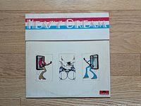 Front of Heavy Cream gatefold sleeve