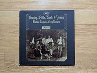 Front cover with album title and band portrait