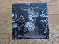 Front of outer jacket showing bar scene artwork