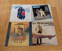 Front covers of the four soundtrack LPs