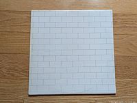 Front of gatefold jacket with white brick design