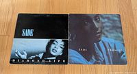 Front jackets of both Sade albums