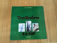 Front cover showing title and photos