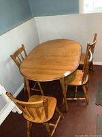 table with three chairs view, showing maple finish and overall size