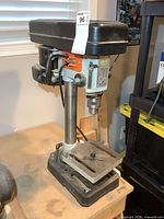 Front left view of Brico RDM-30A drill press on bench