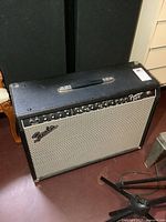 Front view of Fender Frontman 212R amplifier showing grille, control panel and logo