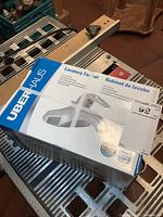 Sealed Uberhaus Luna faucet box front and side views showing product details