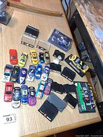 Group of NASCAR diecast cars, display bases, cased F1 car