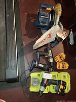 Group shot of all tools, batteries, charger and testers