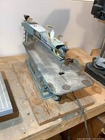 Full view of scroll saw on workbench