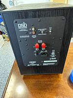 Rear panel showing PSB branding, input/output connectors and power inlet